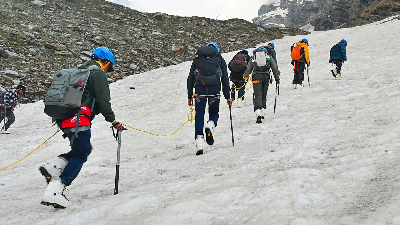 Trekkers are climbing towards up hill