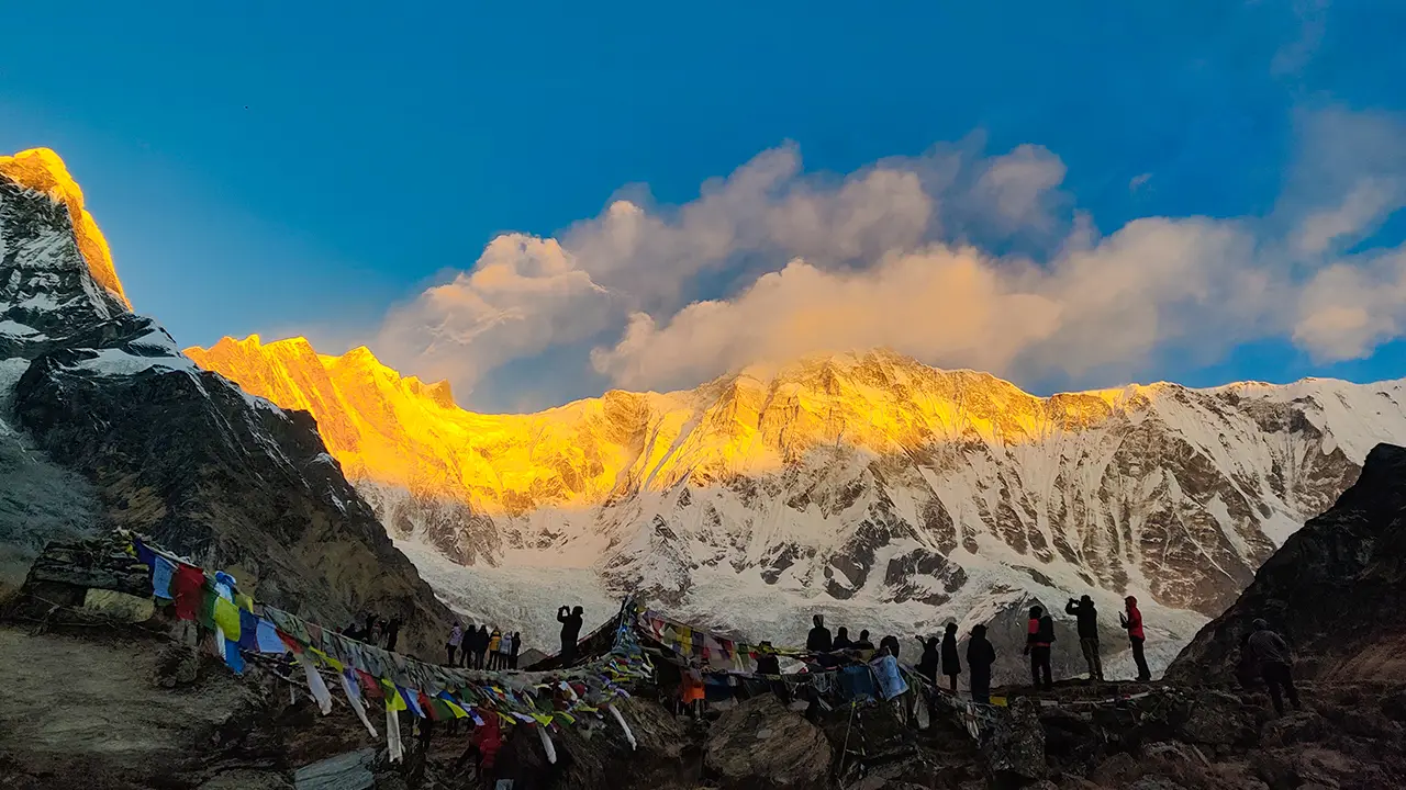 Trekkers are enjoying the moment of sunrise at annapurna base camp